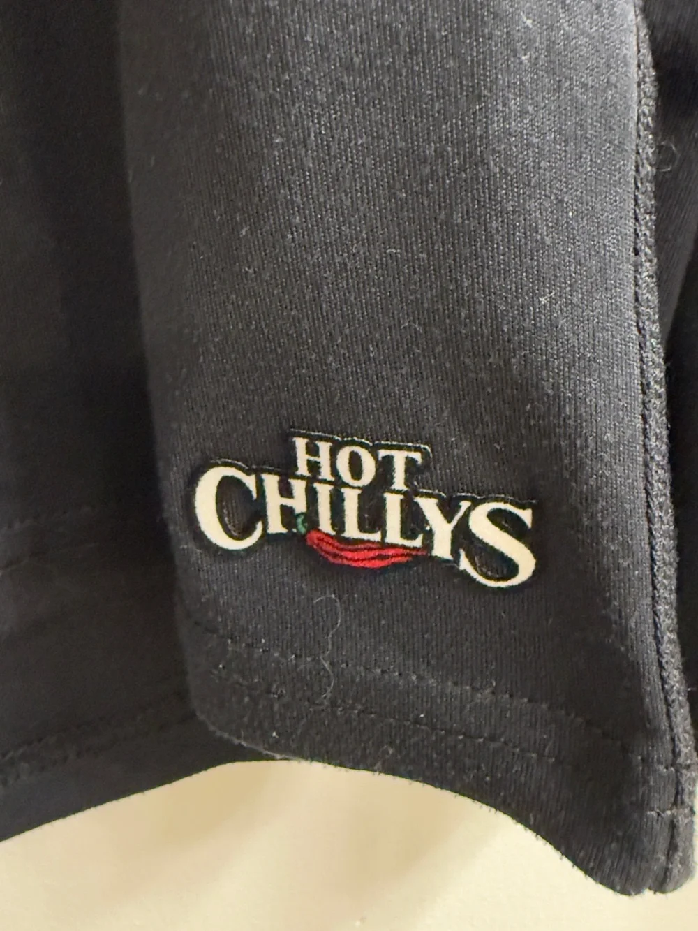 Black Half-Zip Long Sleeve Pullover with Red Zipper Pull